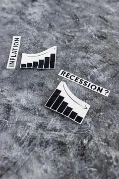 Inflation text next to graphs with stats going up  and recession text next to 스톡 사진