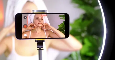 Influencer Applying Skincare in Home Studio Setup Stock Footage 323463571