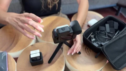 Influencer hands testing camera light intensity Stock Footage 342498271
