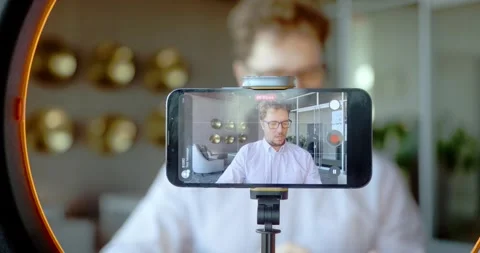 Influencer Recording Video in Office Stock Footage 324589352