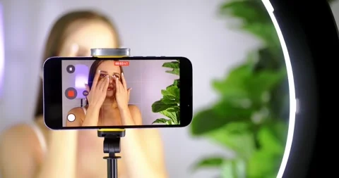 Influencer Records Skincare Tutorial with Smartphone 스톡 동영상 323452327
