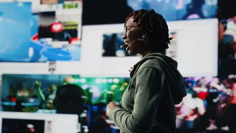 Influencer talking in mic during during tech summit conference Stock Photos