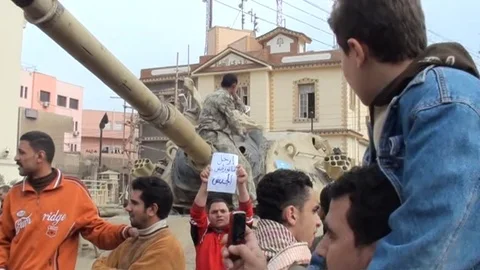 Influential demonstrations revive Tahrir Square during the revolution Stock Footage 114818414