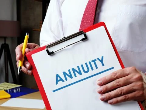 Info about Annuity and the manager offers to sign the documents. Stock Photos