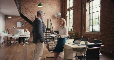 Informal business meeting in shared workspace Stock Footage