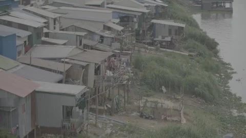 Informal settlement on river, Cambodia Video stock 281859906