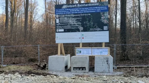 Information board about a wind farm in the Reinhardswald forest Stock Footage 305194412