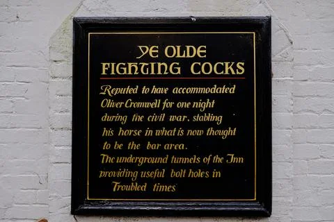 The information board outside the Ye Olde Fighting Cooks pub in St Albans, UK. Stock Photos