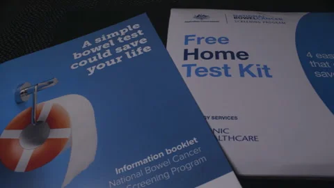 Information Booklet and Home Test Kit for Bowel Cancer Screening Stock Footage 336674484