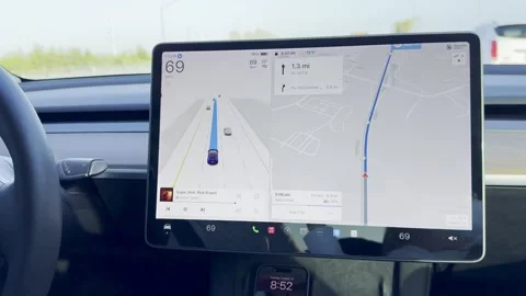 The information screen with full self drive on a Tesla while driving. Stock Footage 294926186