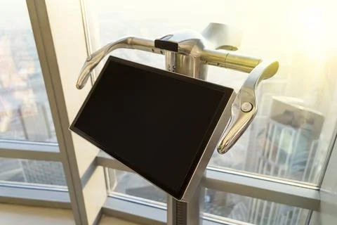 Information screen on top of the tower on the background of a window with a b Stock Photos