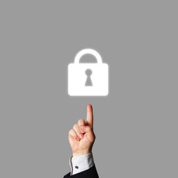 Information security priority. Hand pointing at a lock. Foto stock