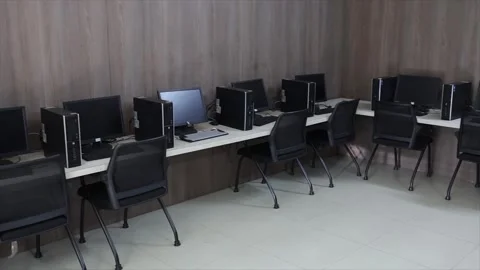 Information Technology Lab with Rows of Desktop Computers Monitors and Stock Footage 333605455