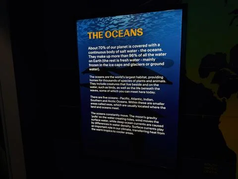 Informative oceans exhibit panel explaining world oceans, marine habitats, .. 스톡 사진