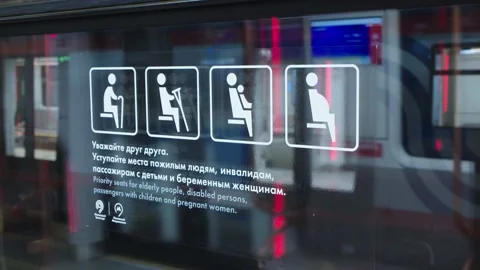 Informative stickers in both russian and english inside the subway train Stock Footage 202049226