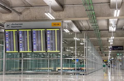 The Informative timetables about flights in the empty hallway at an airport. Stock-Fotos