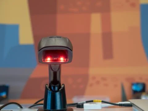 Infrared bar code scanner sitting upright on counter Foto stock