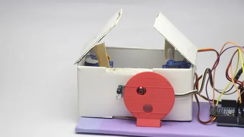 Infrared sensor module that activates the micro servo when it senses object Stock Footage 321893257