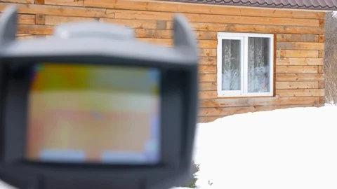 Infrared thermal camera close up. To look for losses of heat. Fight against Stock Footage 106670074