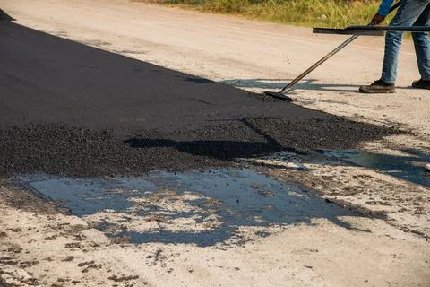 Infrastructure development asphalt paving process documentation at construc.. Stock Photos