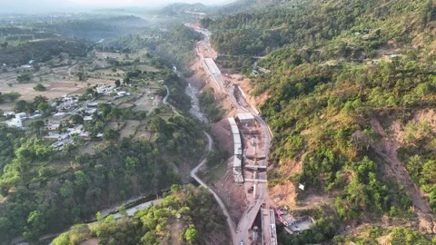 Infrastructure development: New highway cutting through mountains.  Stock-Footage 335639015