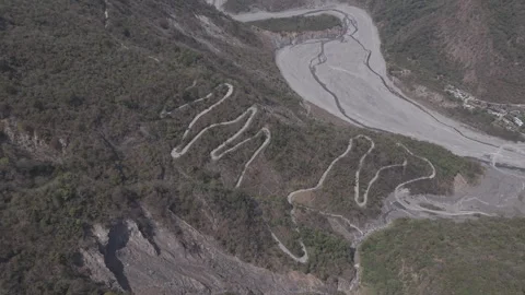 Infrastructure Investment: Navigating Challenging Natural Terrain Stock Footage 331573961