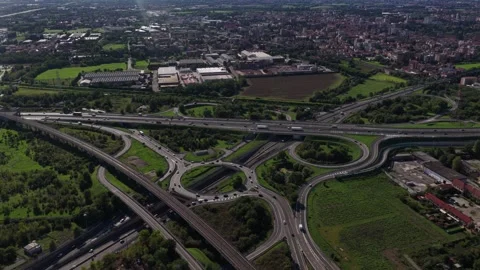 Infrastructure in Italy, featuring roads, roundabouts, and rail tracks. Stock Footage 321134334