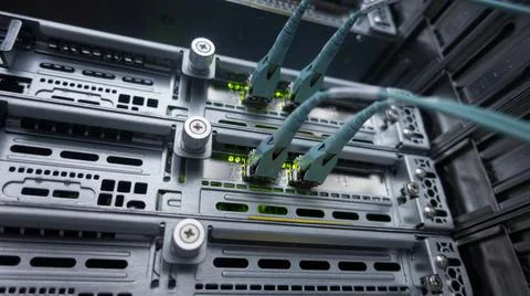 Infrastructure Telecommunication Internet Network Server Rack. Four cables close Stock Photos