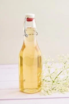 Infused elderflower syrup Stock Photos