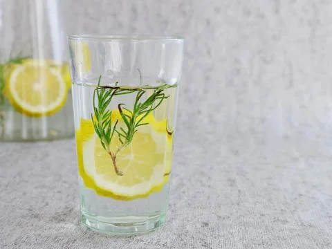 Infused water made from a mixture of water, lemon, and rosemary 写真素材