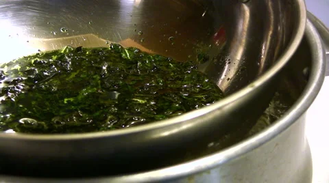 Infusing oil with herbs Stock Footage 5296300
