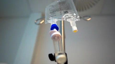 Infusion bag low angle shot slow motion Stock Footage 99576128