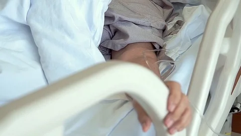 Infusion bottle with saline solution for patient in emergency room Stock Footage 124939681