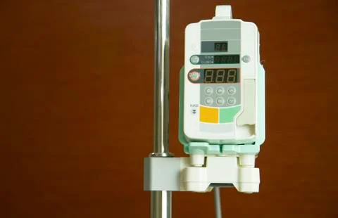 Infusion pump with brown background Stock Photos
