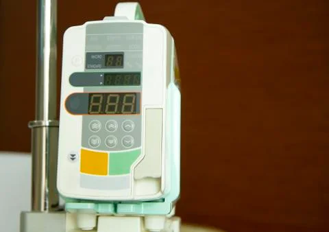 Infusion pump with brown background Stock Photos