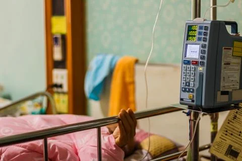 Infusion pump  feeding  drip into patients Stock Photos
