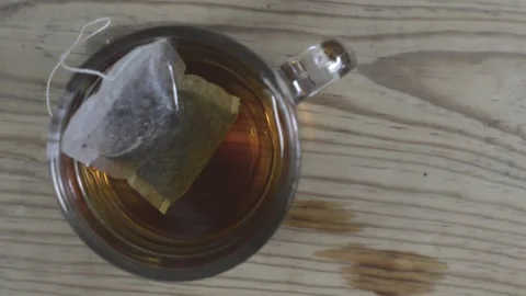 The Infusion: Steeping Tea in Glass Stock Footage 339275285