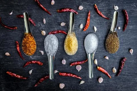 Ingredients and condiment on top of the table, ingredients on dark wooden t.. Stock Photos
