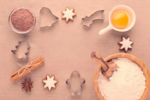 Ingredients and kitchen tools on baking paper, flat lay Stock Photos