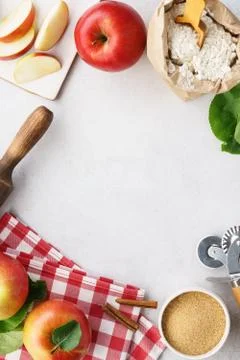 Ingredients and tools for making an apple pie. Stock Photos