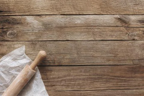 Ingredients for baking and kitchen utensils on old wooden background. Cooking Stock Photos