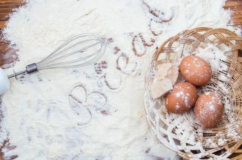 Ingredients for baking bread flour, eggs, yeast. Stock Photos
