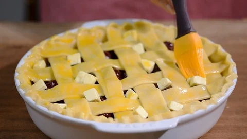 Ingredients for baking cake stuffed with fresh cherry pie. Female preparing Stock Footage 92311957