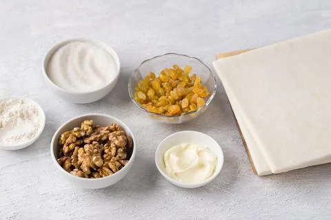 Ingredients for baking Easter cake kraffin: puff pastry, raisins, walnuts, .. Stock-Fotos