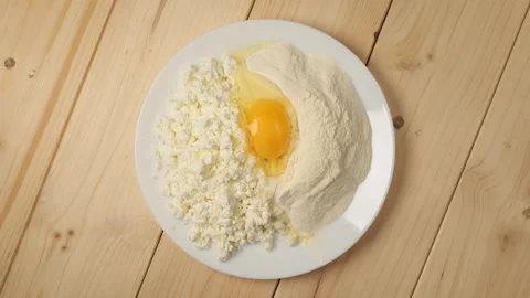 Ingredients for baking rotating on a plate Stock Footage 340159694