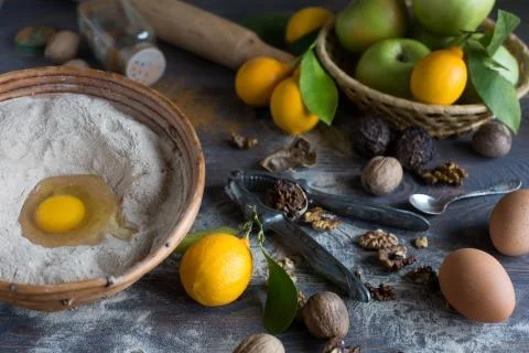 Ingredients for buckwheat flour, apple and lemon tart.  rustic style table. Stock Photos