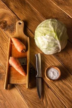 Ingredients for cabbage fermenting on oak table Stock Photos