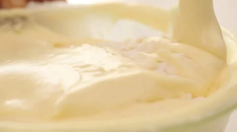 Ingredients for cake being mixed by hand mixer Stock Footage 51935825