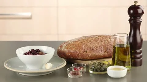 Ingredients for crostini with olive paste Stock Footage 24670524