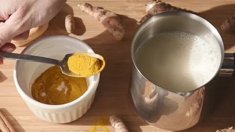 Ingredients for curcuma latte. Stock Footage 142825799